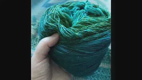 в процессе вязания топа из пряжи Yarnart flowers moonlight с люрексом