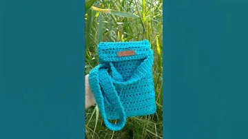 Look at this little phone purse🌊 It's a bright accent to your look💓  #knitting#crochet#handmade